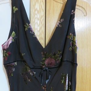 Sleeveless dress with flocked flowers and beads